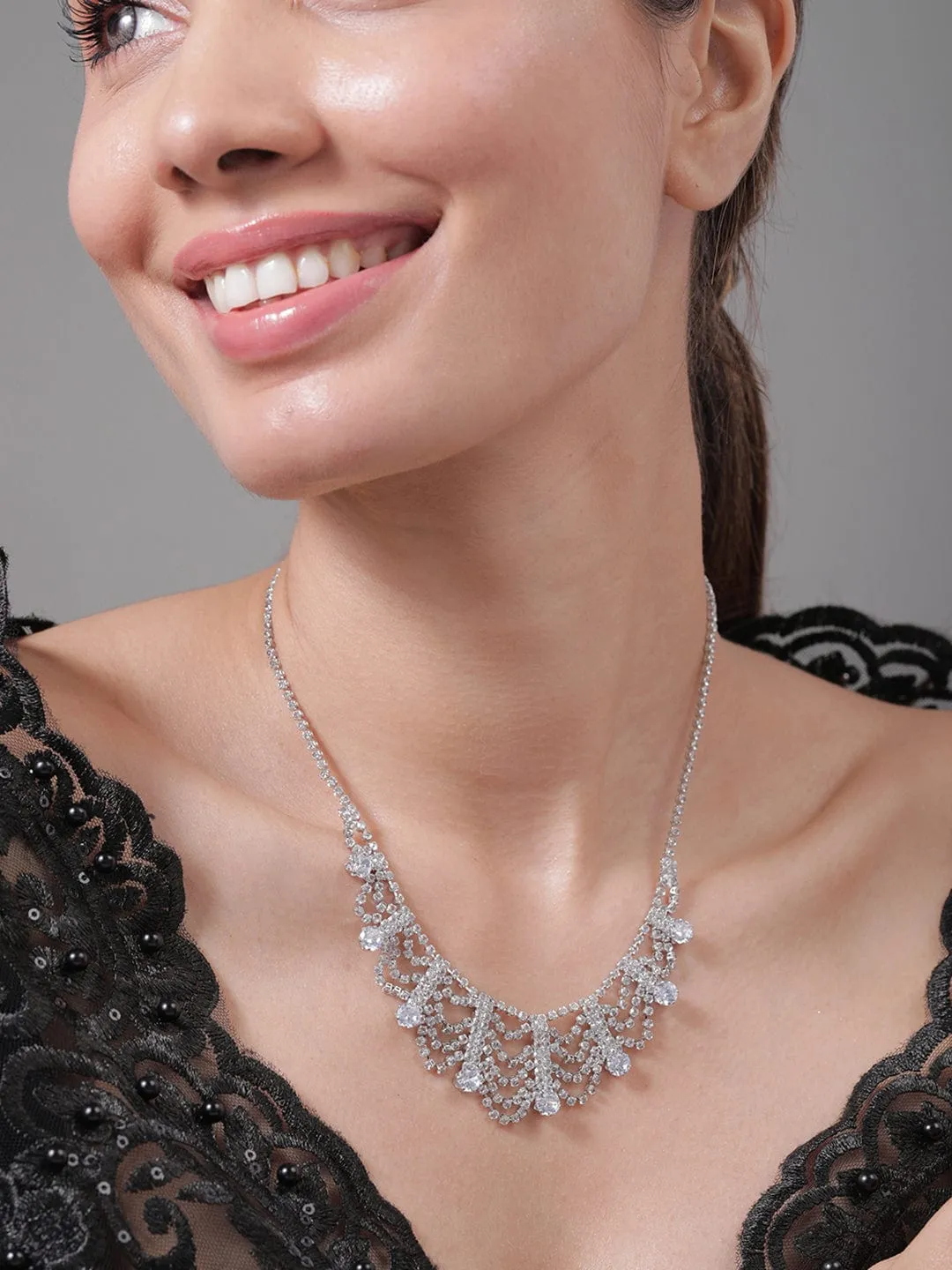 Rhodium Plated AD & Cubic Zirconia Studded Luxurious Draped Statement Necklace