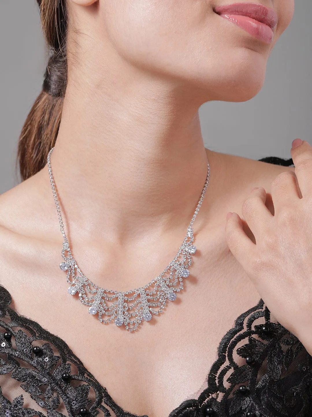 Rhodium Plated AD & Cubic Zirconia Studded Luxurious Draped Statement Necklace