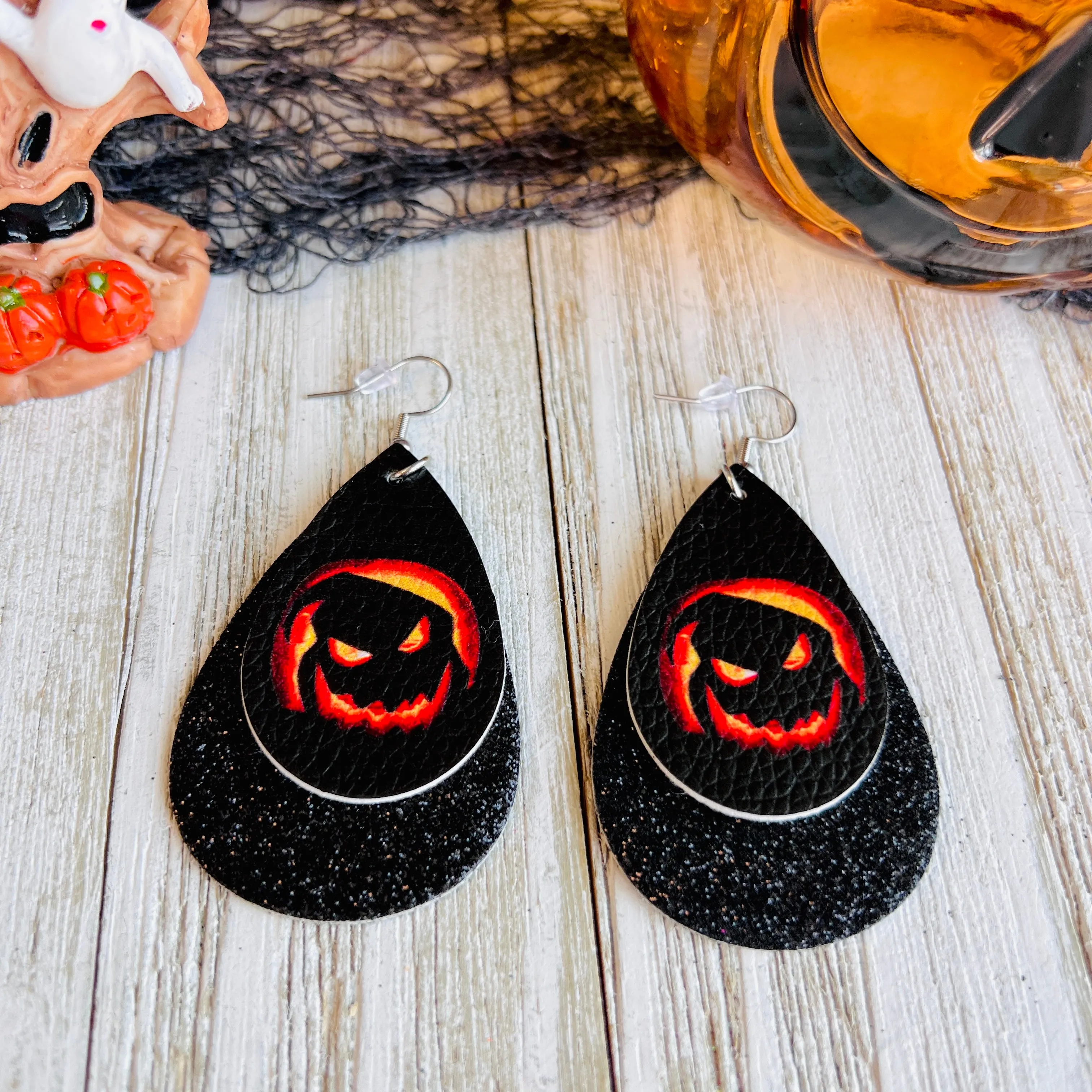 Sparkling Spooky Jack-O-Lantern Faux Leather Drop Ear Bling