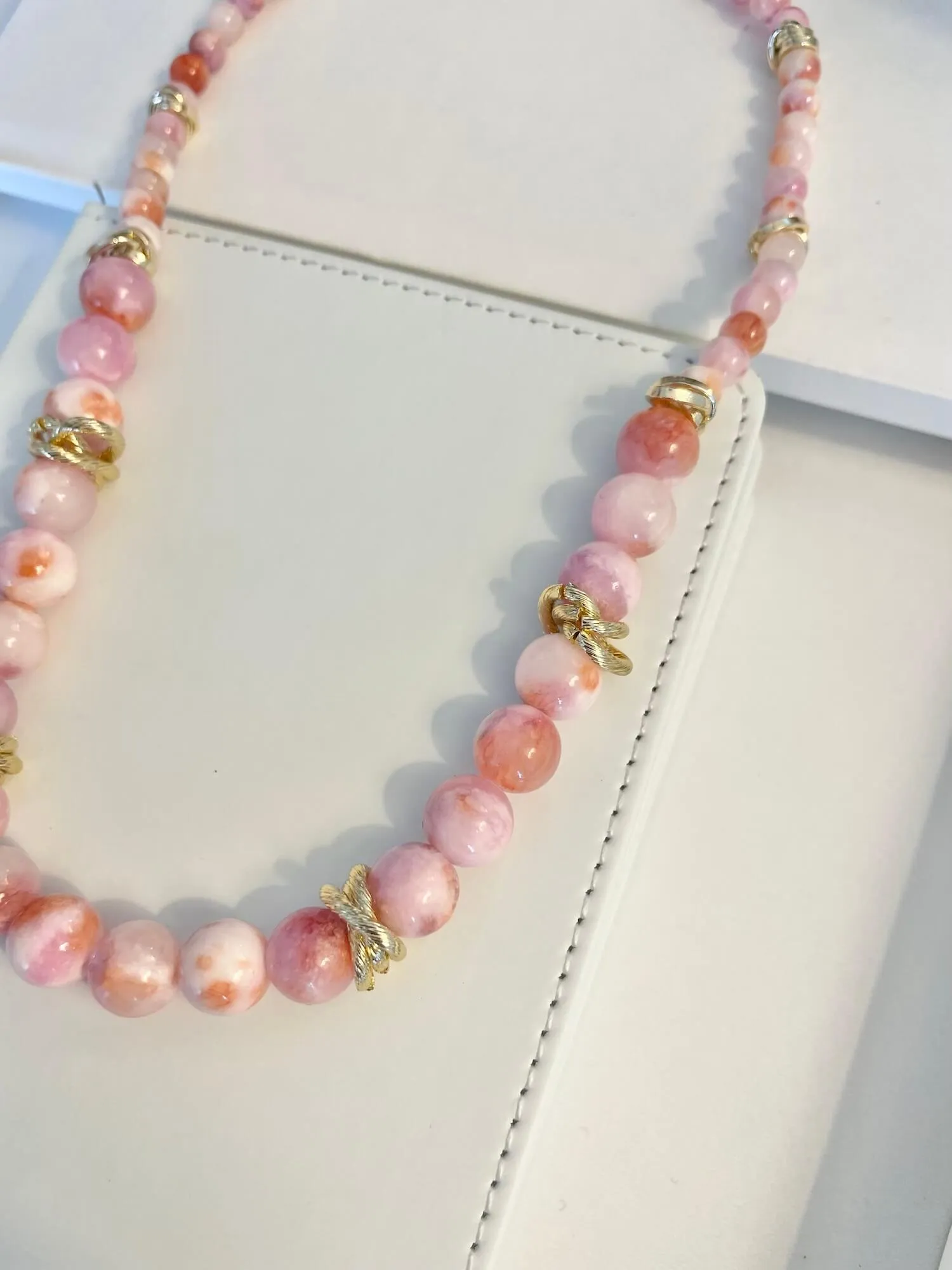 Vintage 1970's soft pink glass beaded necklace, with a dusting of gold.... so timeless