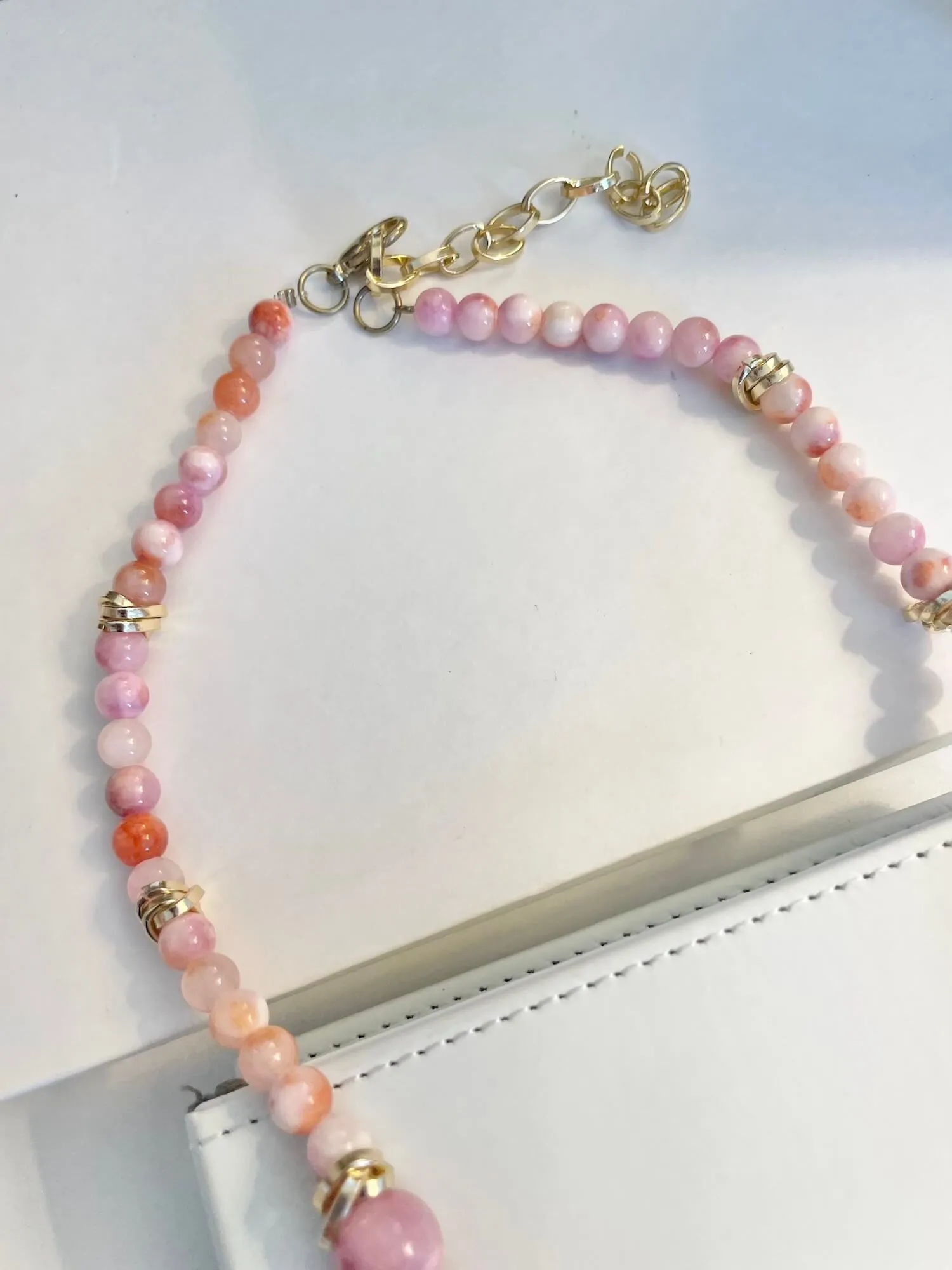 Vintage 1970's soft pink glass beaded necklace, with a dusting of gold.... so timeless