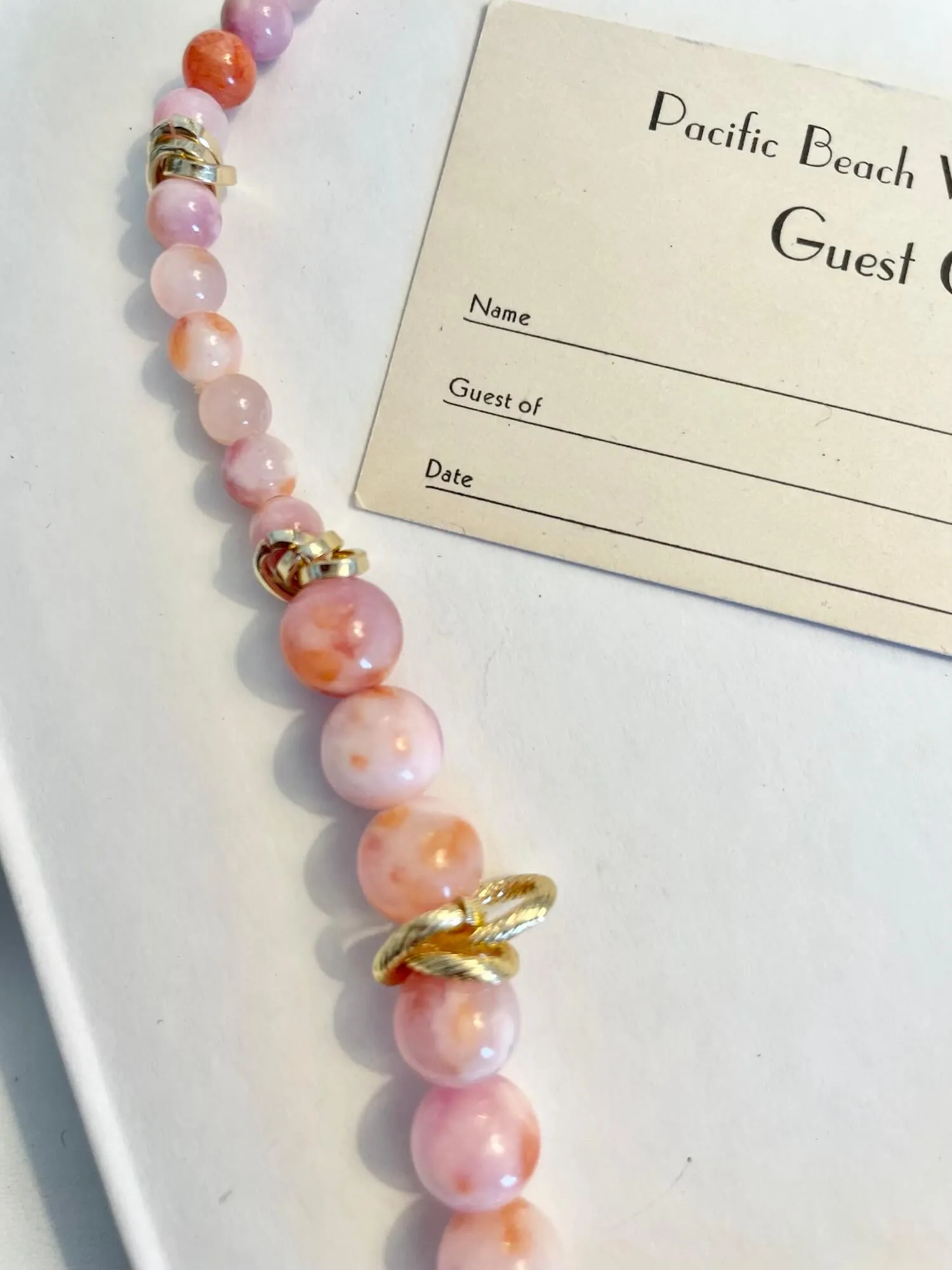 Vintage 1970's soft pink glass beaded necklace, with a dusting of gold.... so timeless